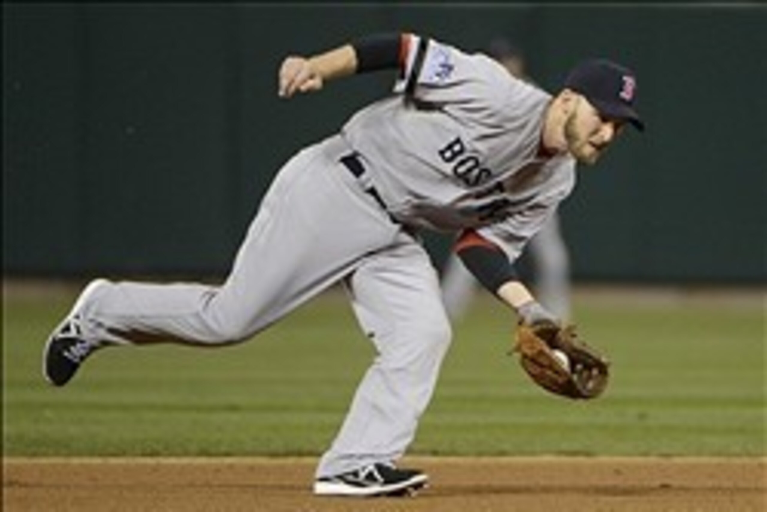 Oct 26, 2013; St. Louis, MO, USA; Boston Red Sox shortstop Stephen Drew fields a ground ball in the 5th inning against the St. Louis Cardinals during game three of the MLB baseball World Series at Busch Stadium. Mandatory Credit: Eileen Blass-USA TODAY Sp