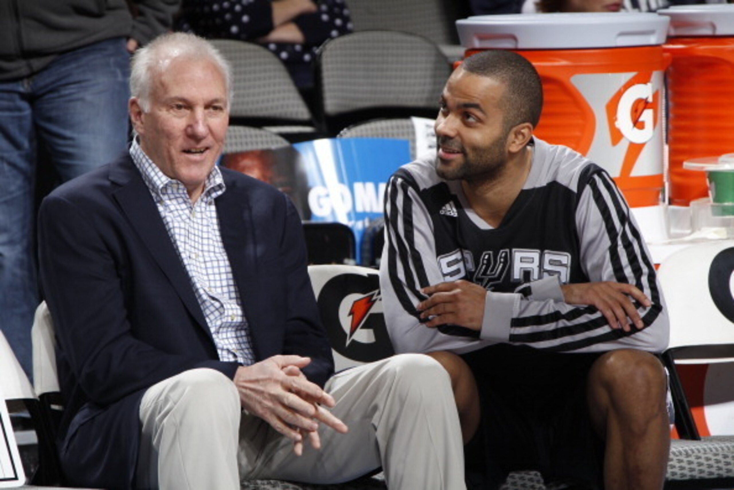 DALLAS, TX - DECEMBER 26:  Gregg Popovich and Tony Parker #9 of the San Antonio Spurs talk before the game against the Dallas Mavericks on December 26, 2013 at the American Airlines Center in Dallas, Texas. NOTE TO USER: User expressly acknowledges and ag