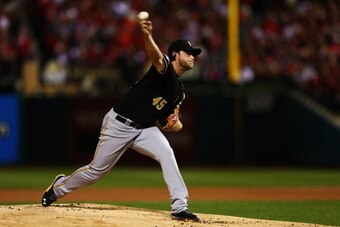 ST LOUIS, MO - OCTOBER 09:  Gerrit Cole #45 of the Pittsburgh Pirates throws the first pitch of the first inning against the St. Louis Cardinals during Game Five of the National League Division Series at Busch Stadium on October 9, 2013 in St Louis, Misso