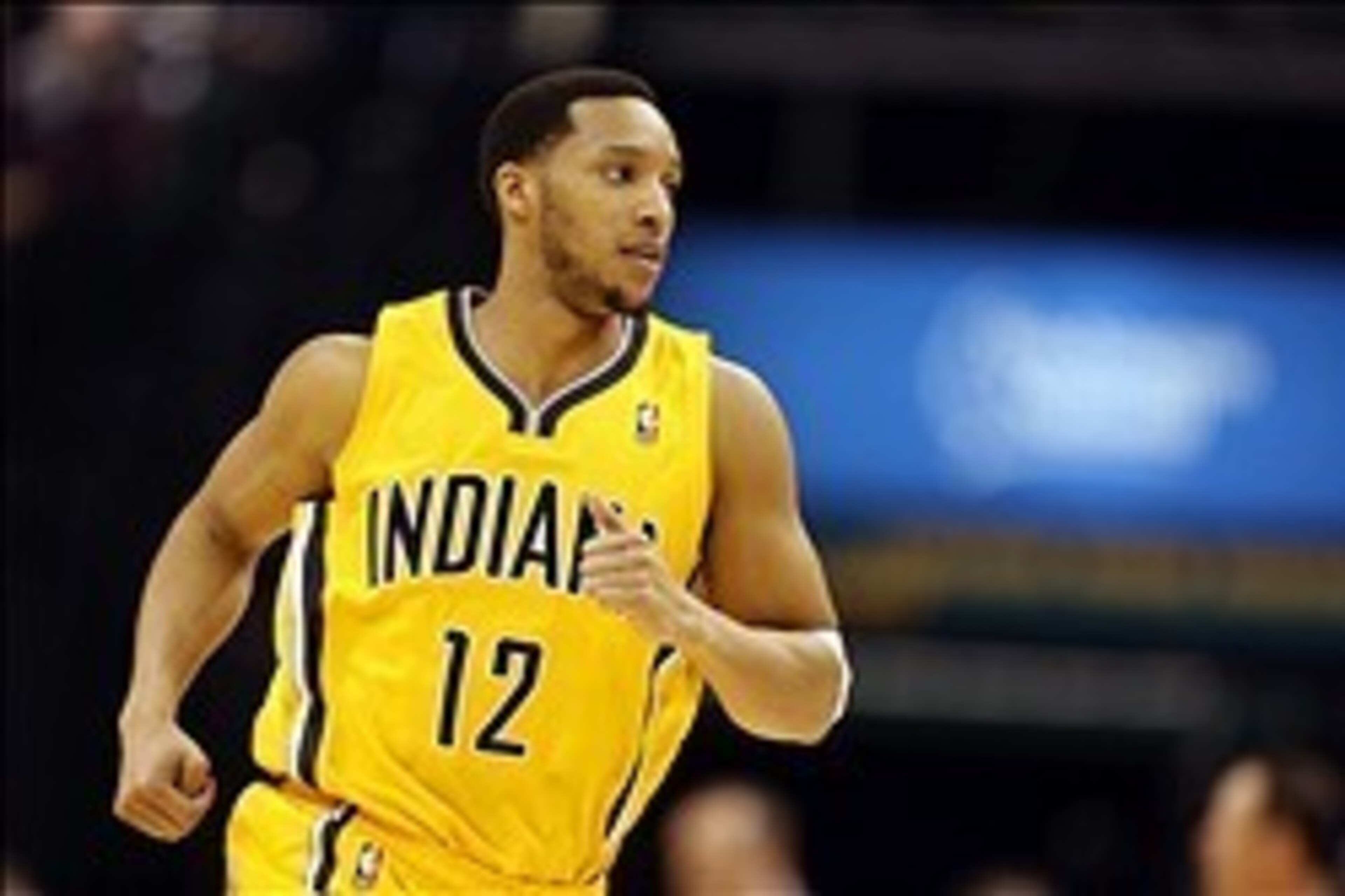 Feb 25, 2014; Indianapolis, IN, USA; Indiana Pacers guard Evan Turner (12) runs up the floor during a game against the Los Angeles Lakers at Bankers Life Fieldhouse. Mandatory Credit: Brian Spurlock-USA TODAY Sports