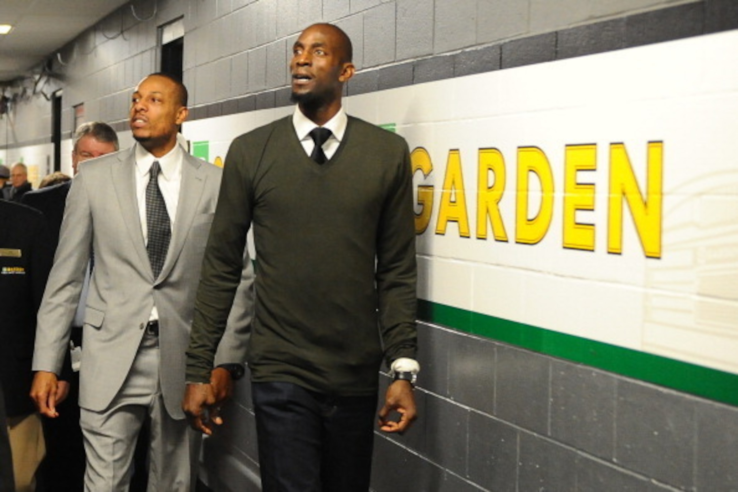 BOSTON, MA - JANUARY 26: Paul Pierce #34 and Kevin Garnett #2 of the Brooklyn Nets walk down the hallway to the press room after the game against the Boston Celtics on January 26, 2014 at the TD Garden in Boston, Massachusetts.  NOTE TO USER: User express