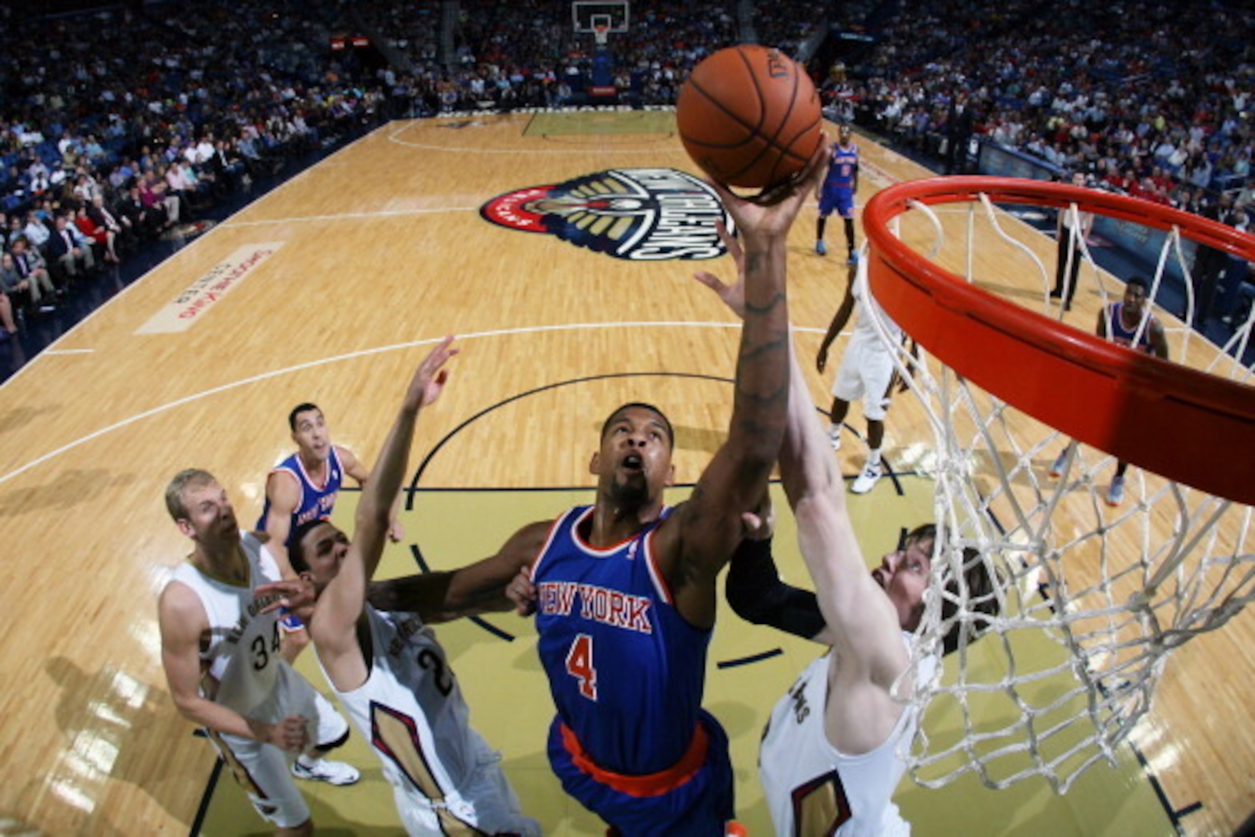 NEW ORLEANS, LA - FEBRUARY 19: Jeremy Tyler #4 of the New York Knicks grabs a rebound against the New Orleans Pelicans on February 19, 2014 at the New Orleans Arena in New Orleans, Louisiana. NOTE TO USER: User expressly acknowledges and agrees that, by d