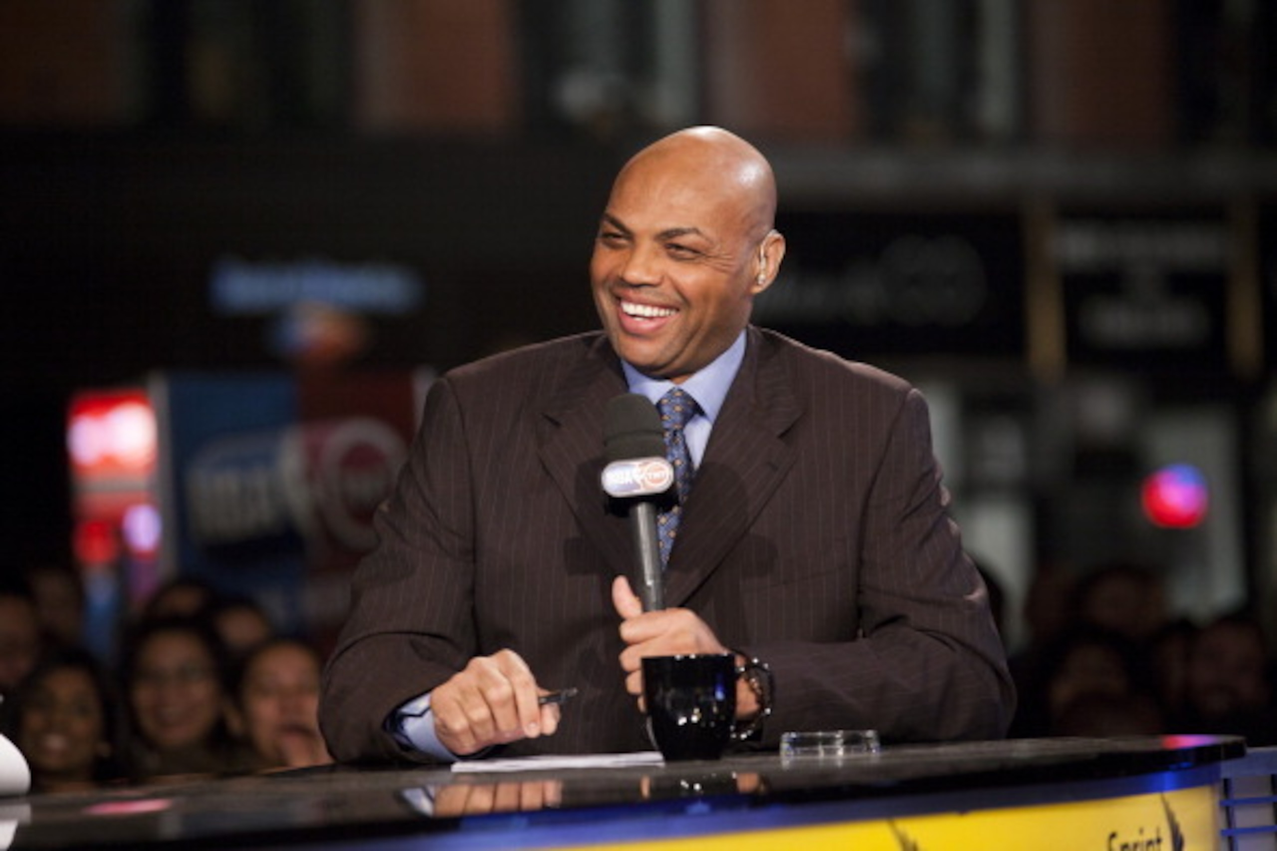 NEW YORK CITY - OCTOBER 29: TNT analyst Charles Barkley laughs as the NBA season tips off as TNT broadcasts outside the Flatiron Building on October 29 , 2013 in New York. NOTE TO USER: User expressly acknowledges and agrees that, by downloading and or us