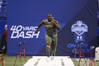 INDIANAPOLIS, IN - FEBRUARY 22: Former Auburn offensive lineman Greg Robinson runs the 40-yard dash during the 2014 NFL Combine at Lucas Oil Stadium on February 22, 2014 in Indianapolis, Indiana. (Photo by Joe Robbins/Getty Images)