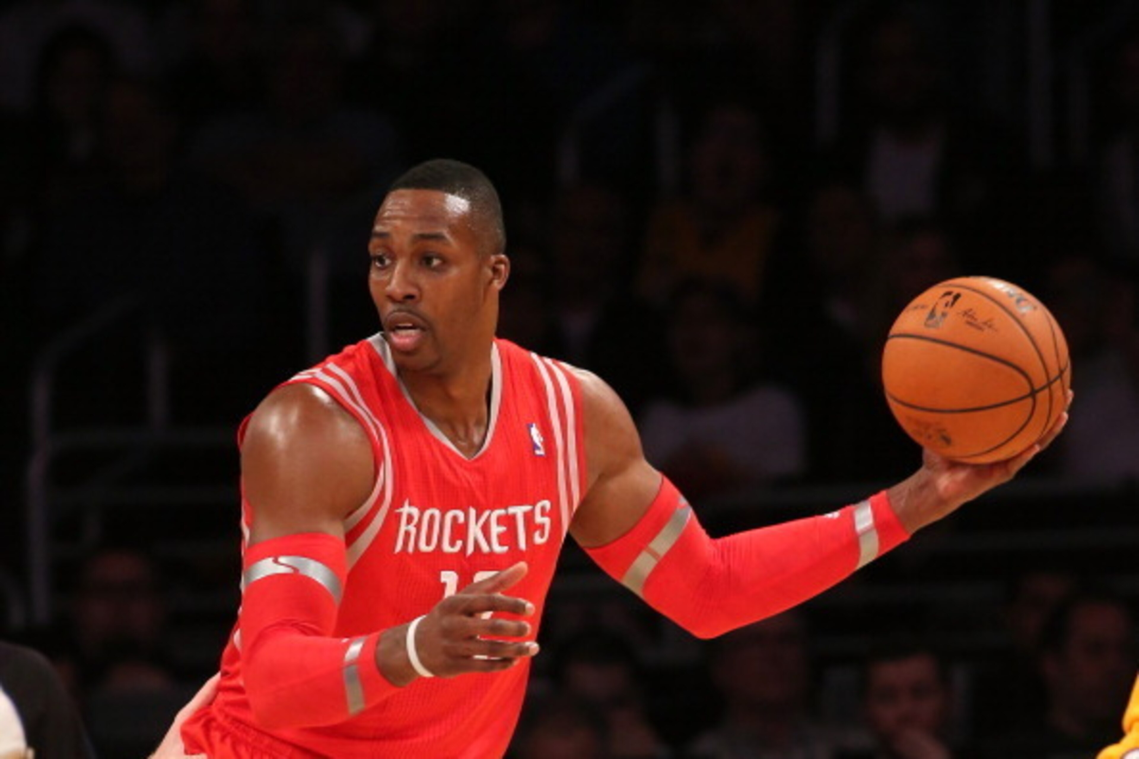 LOS ANGELES, CA - FEBRUARY 19:  Dwight Howard #12 of the Houston Rockets handles the ball against the Los Angeles Lakers at Staples Center on February 19, 2014 in Los Angeles, California.  NOTE TO USER: User expressly acknowledges and agrees that, by down
