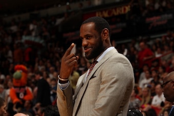 MIAMI, FL - February 23: LeBron James #6 of the Miami Heat smiles and looks on against the Chicago Bulls at the American Airlines Arena in Miami, Florida on Feb. 3, 2014. NOTE TO USER: User expressly acknowledges and agrees that, by downloading and/or usi