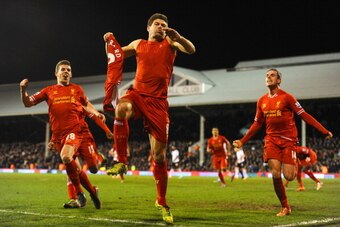 LONDON, ENGLAND - FEBRUARY 12:  Steven Gerrard of Liverpool celebrates scoring their third goal from the penalty spot during the Barclays Premier League match between Fulham and Liverpool at Craven Cottage on February 12, 2014 in London, England.  (Photo 