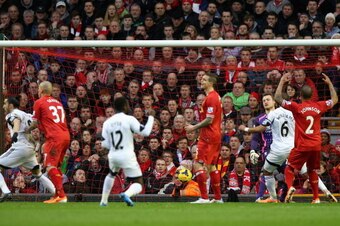 LIVERPOOL, ENGLAND - FEBRUARY 23:  Simon Mignolet of Liverpool reacts after Swansea's second goal during the Barclays Premier League match between Liverpool and Swansea City at Anfield on February 23, 2014 in Liverpool, England.  (Photo by Clive Brunskill