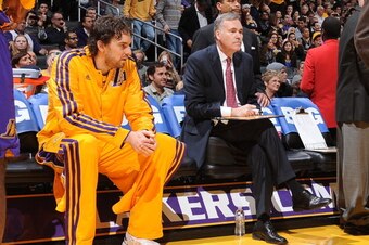LOS ANGELES, CA - NOVEMBER 30: Pau Gasol #16 and head coach Mike D'Antoni of the Los Angeles Lakers sit on the bench before a game against the Denver Nuggets at Staples Center on November 30, 2012 in Los Angeles, California. NOTE TO USER: User expressly a