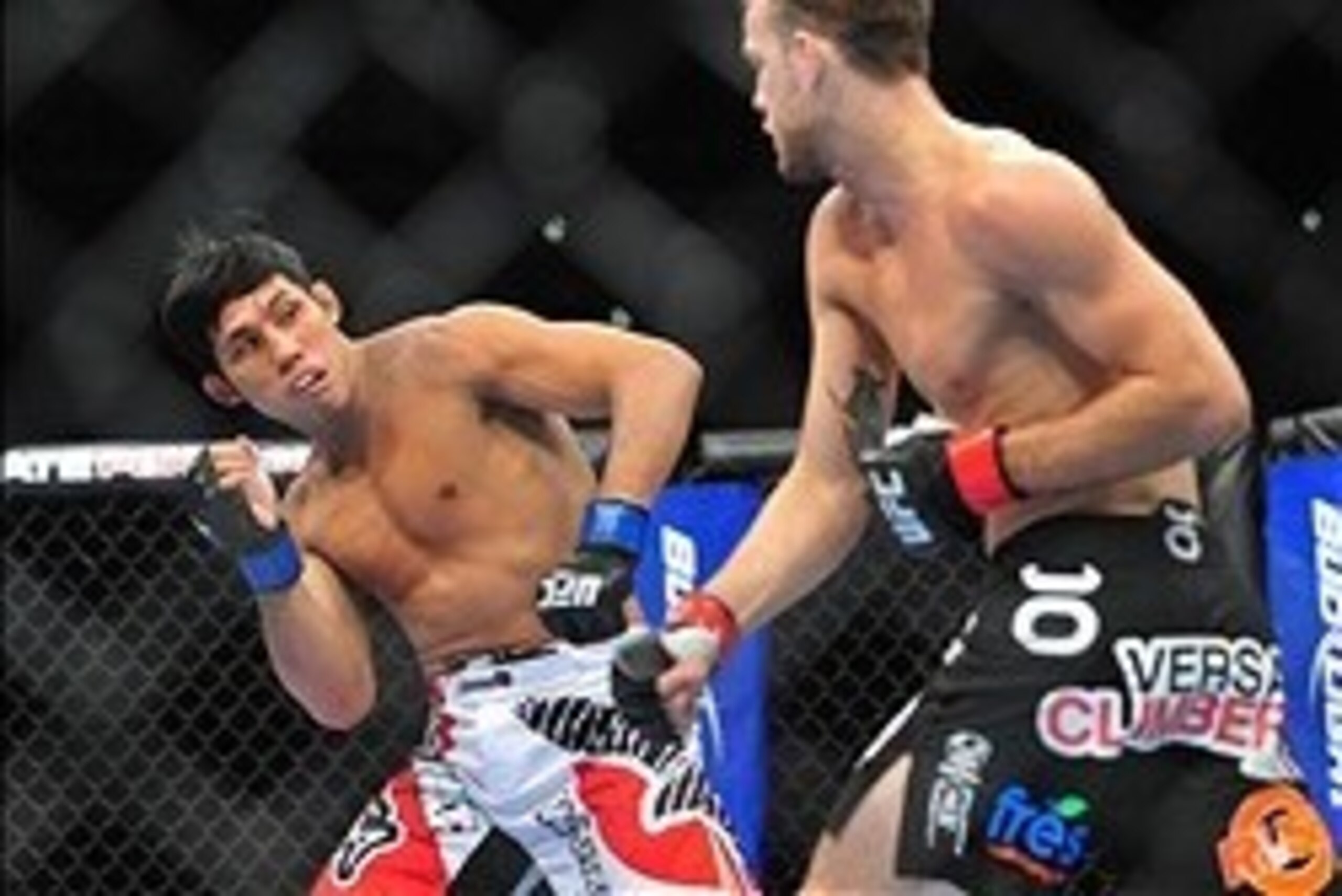 August 4, 2012; Los Angeles, CA, USA; Nam Phan avoids Cole Miller during the featherweight match at Staples Center. Mandatory Credit: Gary A. Vasquez-USA TODAY Sports August 4, 2012; Los Angeles, CA, USA; Nam Phan avoids Cole Miller during the featherweight match at Staples Center. Mandatory Credit: Gary A. Vasquez-USA TODAY Sports