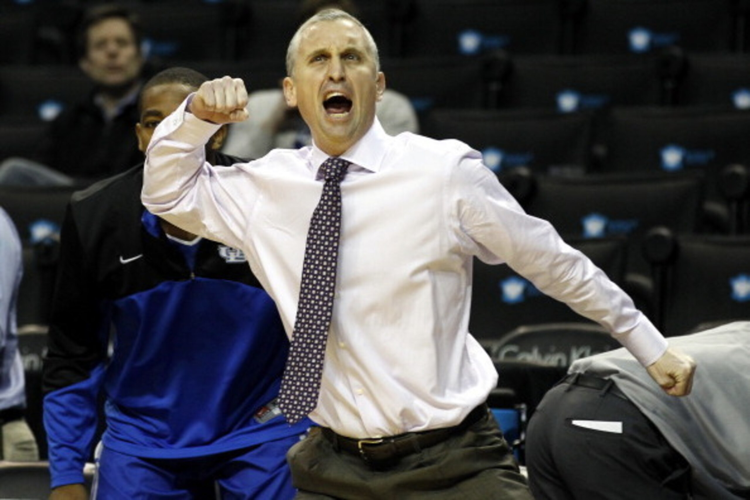 NEW YORK, NY - DECEMBER 21: Head coach Bobby Hurley of the Buffalo Bulls reacts against the Manhattan Jaspers during the Brooklyn Hoops Holiday Invitational at Barclays Center on December 21, 2013 in the Brooklyn borough of New York City. (Photo by Adam H