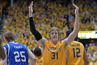 WICHITA, KS - FEBRUARY 22:  Guard Ron Baker #31 of the Wichita State Shockers reacts after a Shockers score against the Drake Bulldogs during the second half on February 22, 2014 at Charles Koch Arena in Wichita, Kansas.  Wichita State won 83-54.  (Photo 