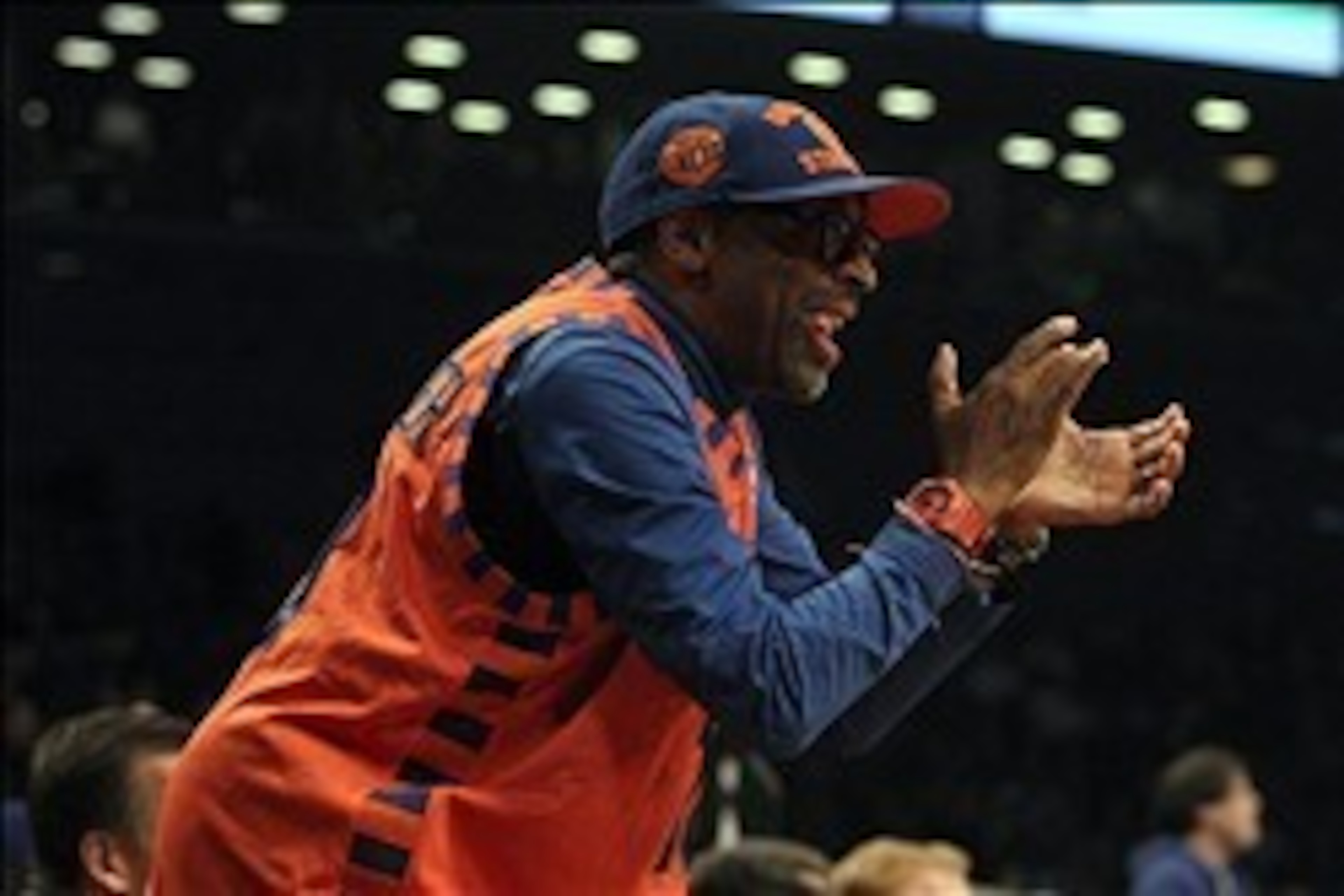 Dec 5, 2013; Brooklyn, NY, USA; Actor and New York Knicks fan Spike Lee cheers during the first quarter against the Brooklyn Nets at Barclays Center. Mandatory Credit: Brad Penner-USA TODAY Sports
