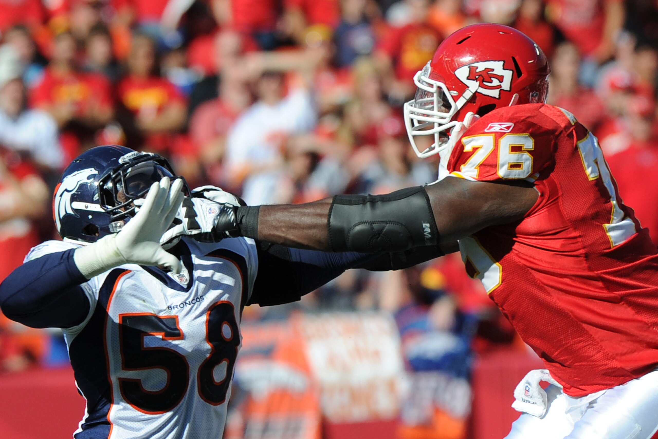 KANSAS CITY, MO - NOVEMBER 13:  Offensive tackle Branden Albert #76 of the Kansas City Chiefs blocks linebacker Von Miller #58 of the Denver Broncos during the first half on November 13, 2011  at Arrowhead Stadium in Kansas City, Missouri.  Denver defeate