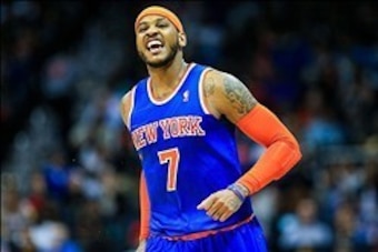 Feb 22, 2014; Atlanta, GA, USA; New York Knicks small forward Carmelo Anthony (7) celebrates after shooting a three in the second half against the Atlanta Hawks at Philips Arena. The Hawks won 107-98. Mandatory Credit: Daniel Shirey-USA TODAY Sports