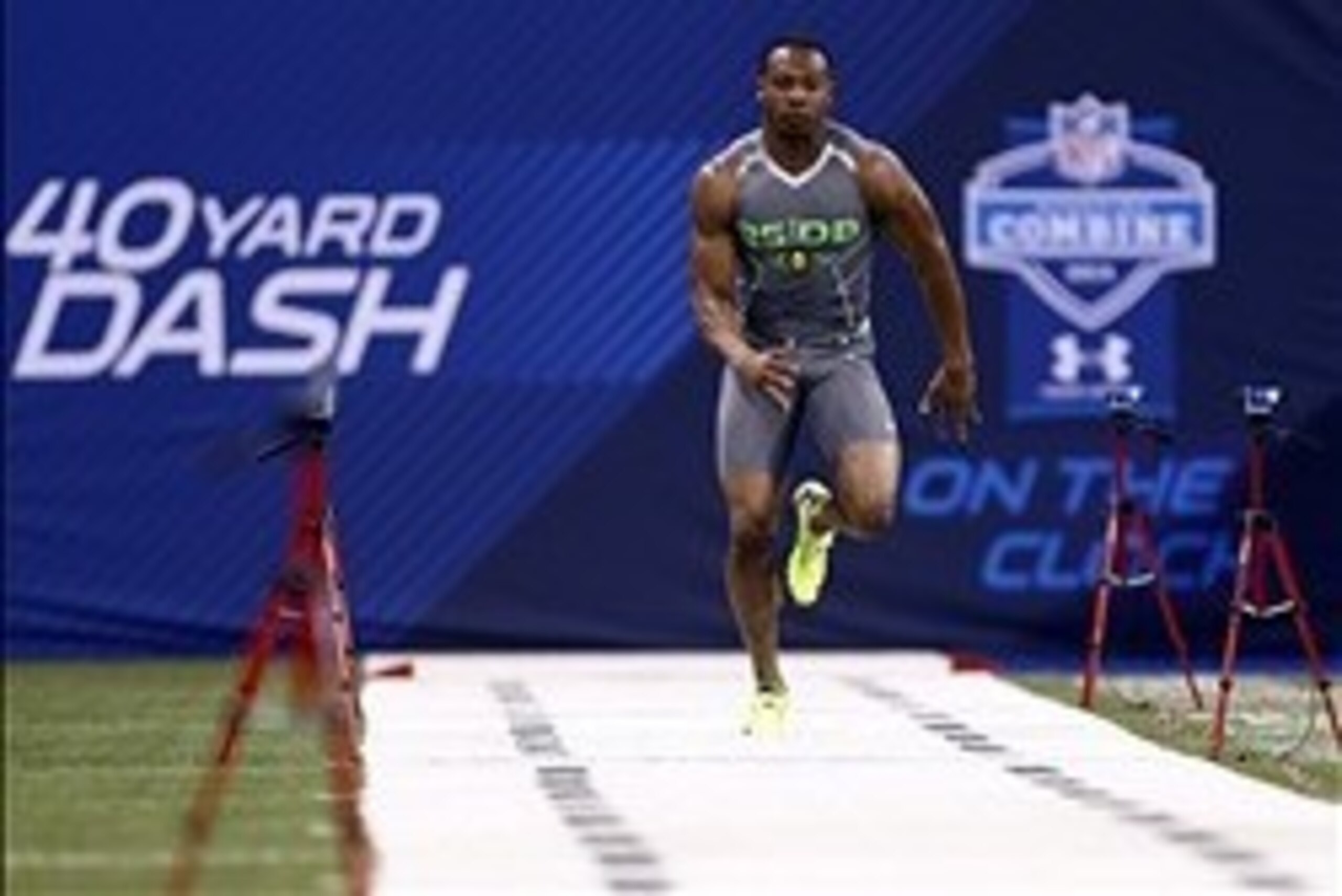 Feb 25, 2014; Indianapolis, IN, USA; Oklahoma State Cowboys defensive back Justin Gilbert runs the 40 yard dash during the 2014 NFL Combine at Lucas Oil Stadium. Mandatory Credit: Brian Spurlock-USA TODAY Sports