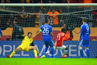 ISTANBUL, TURKEY - FEBRUARY 26:  Aurelien Chedjou of Galatasaray scores their first goal past Petr Cech of Chelsea during the UEFA Champions League Round of 16 first leg match between Galatasaray AS and Chelsea at Ali Sami Yen Arena on February 26, 2014 i