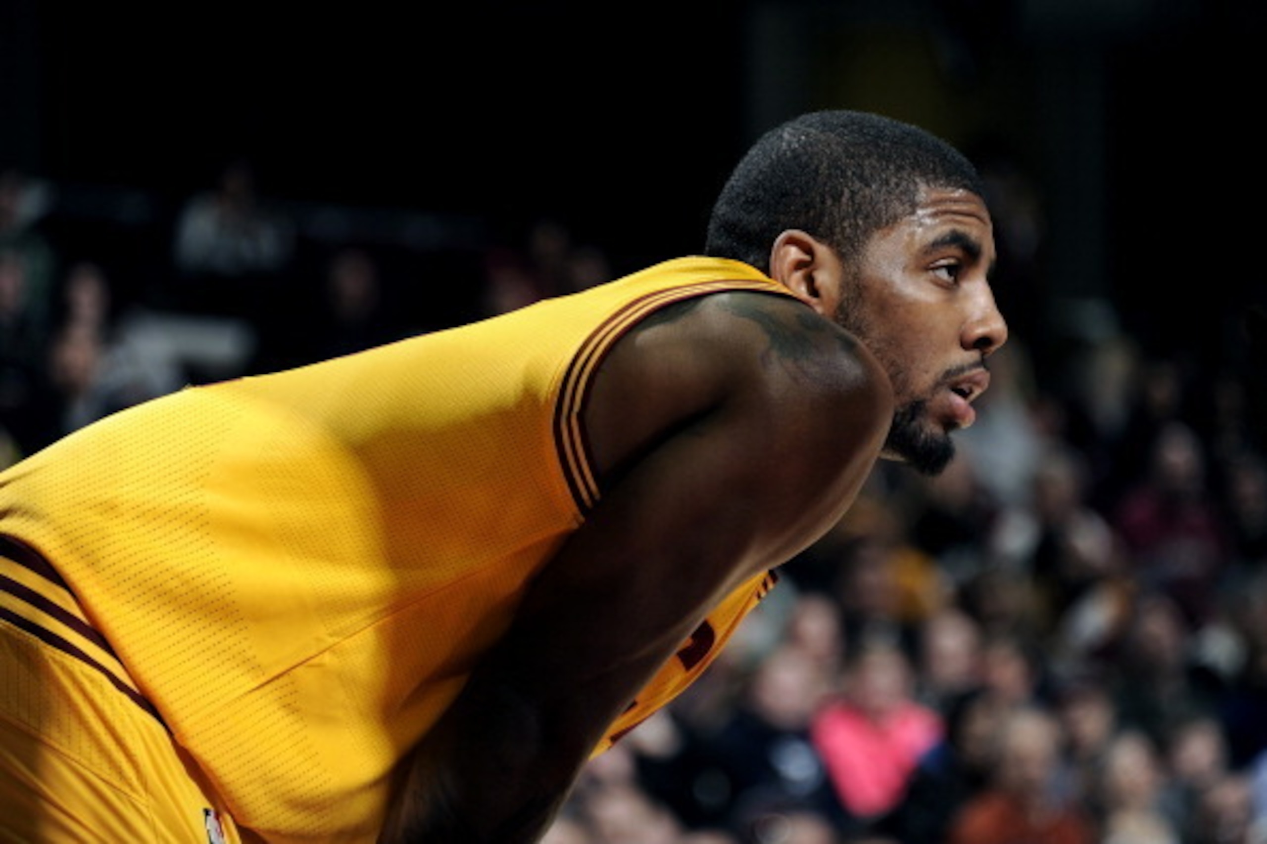 CLEVELAND, OH - FEBRUARY 9:  Kyrie Irving #2 of the Cleveland Cavaliers stands on the court against the Memphis Grizzlies at The Quicken Loans Arena on February 9, 2014 in Cleveland, Ohio. NOTE TO USER: User expressly acknowledges and agrees that, by down