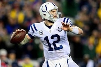 Jan 11, 2014; Foxborough, MA, USA; Indianapolis Colts quarterback Andrew Luck (12) looks to pass during the fourth quarter of the 2013 AFC divisional playoff football game against the New England Patriots at Gillette Stadium. Mandatory Credit: Andrew Webe