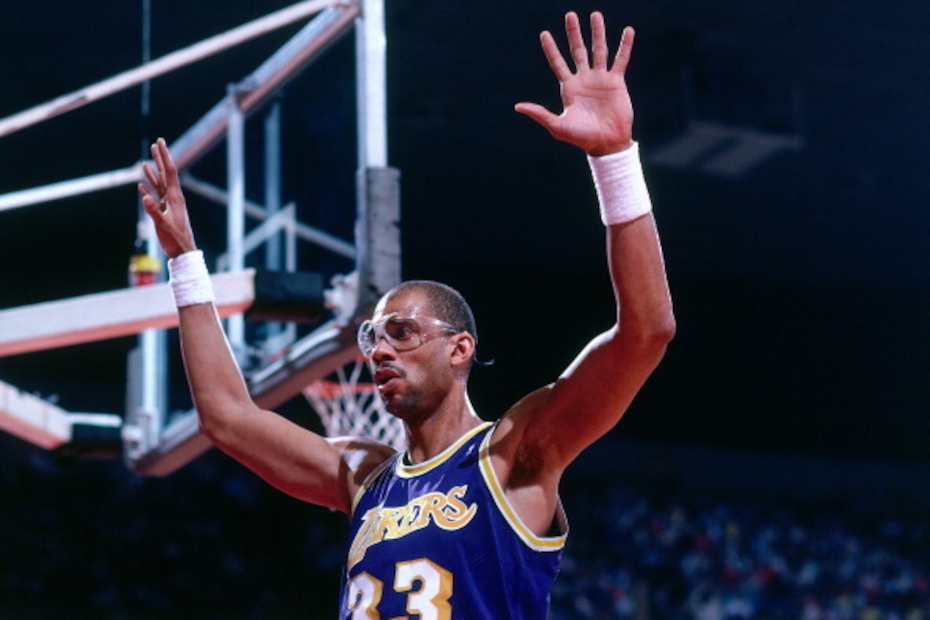 PORTLAND, OR - 1988: Kareem Abdul Jabbar #33 of the Los Angeles Lakers defends against the Portland Trail Blazers during a game played circa 1987 at the Veterans Memorial Coliseum in Portland, Oregon. NOTE TO USER: User expressly acknowledges and agrees t