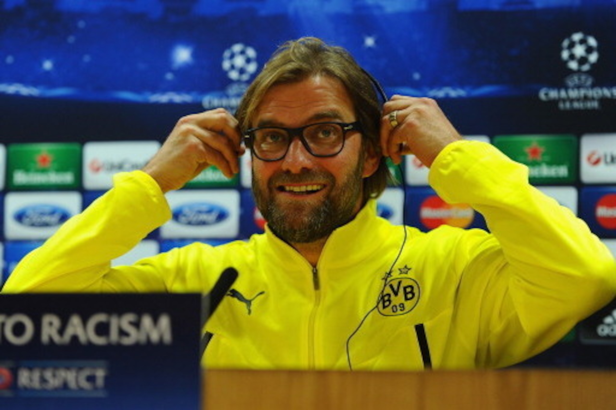 LONDON, ENGLAND - OCTOBER 21:  Borussia Dortmund coach Jurgen Klopp faces the media during a Borussia Dortmund press conference ahead of the UEFA Champions League Group F match against Arsenal at Emirates Stadium on October 21, 2013 in London, England.  (