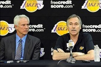 November 15, 2012; El Segundo, CA, USA;    Los Angeles Lakers general manager Mitch Kupchak (left) sits next to new head coach Mike D'Antoni during a press conference at the training facility in El Segundo.  Mandatory Credit: Jayne Kamin-Oncea-USA TODAY S