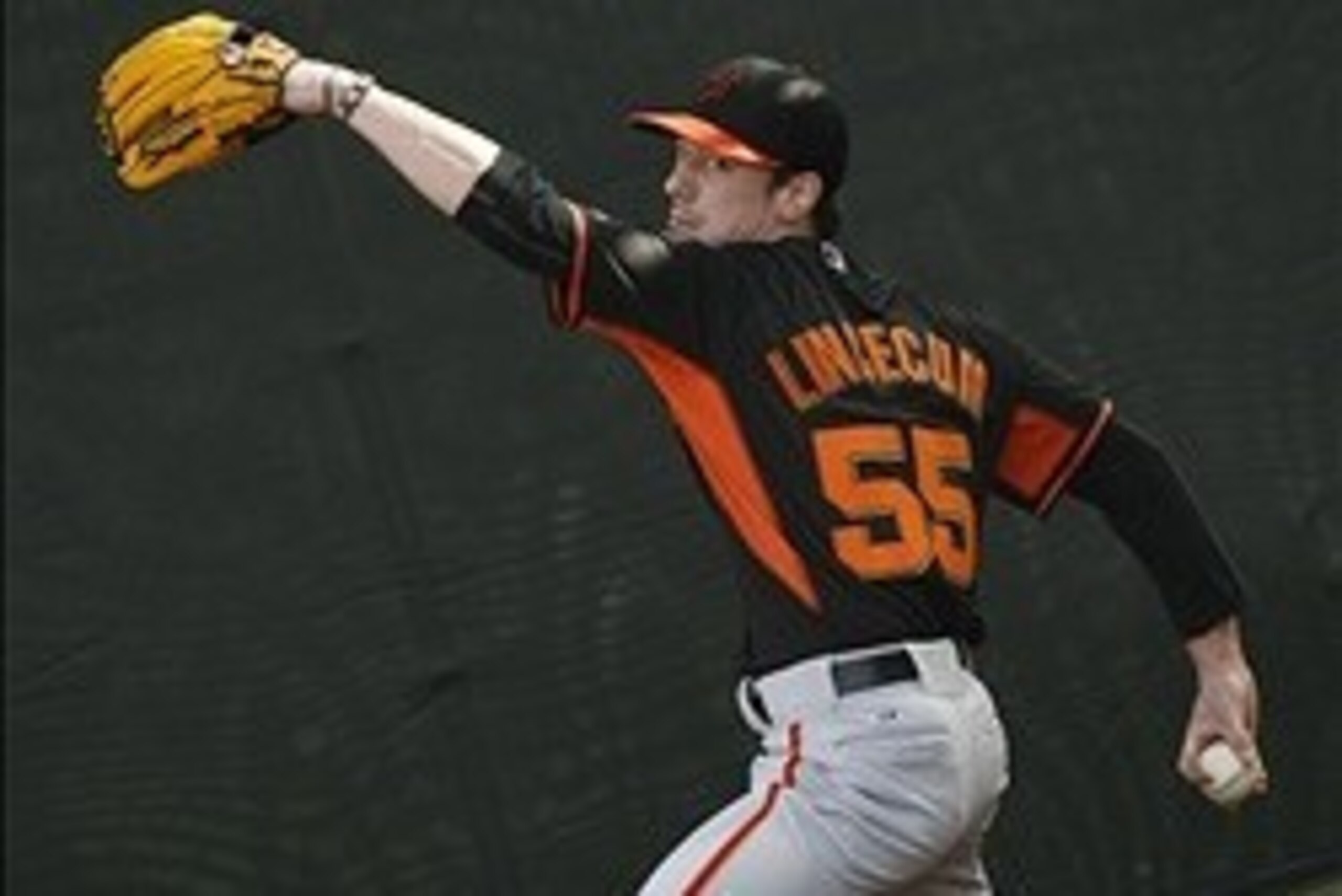 Feb 16, 2014; Scottsdale, AZ, USA; San Francisco Giants starting pitcher Tim Lincecum (55) throws in the bullpen during camp at Scottsdale Stadium. Mandatory Credit: Rick Scuteri-USA TODAY Sports