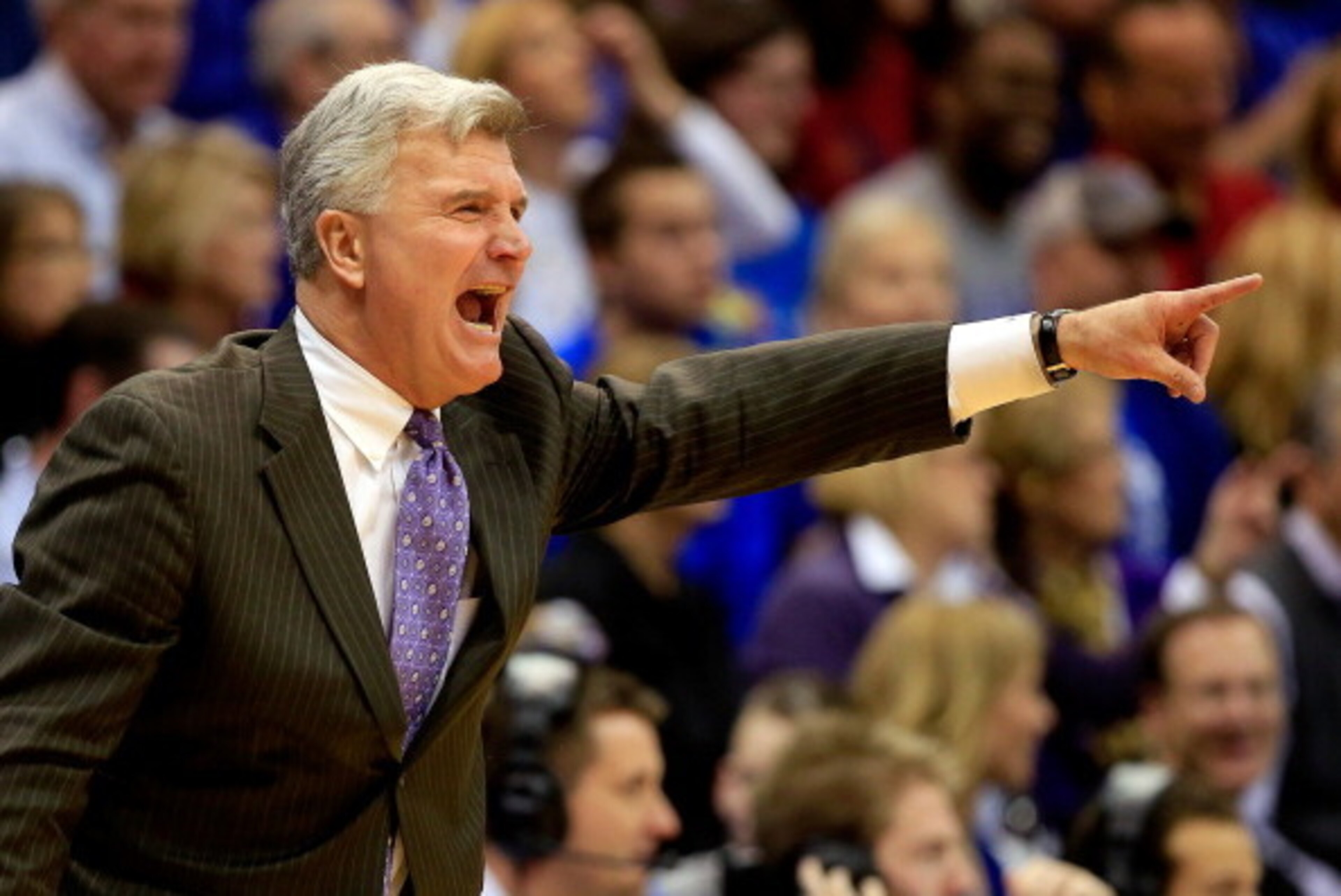 LAWRENCE, KS - JANUARY 11:  Head coach Bruce Weber of the Kansas State Wildcats yells from the bench during the game against the Kansas Jayhawks at Allen Fieldhouse on January 11, 2014 in Lawrence, Kansas.  (Photo by Jamie Squire/Getty Images)