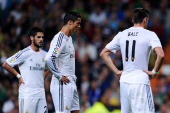 MADRID, SPAIN - SEPTEMBER 28:  Gareth Bale (L) Cristiano Ronaldo (C) and Francisco Alarcon Isco of Real Madrid CF look on during the La Liga match between Real Madrid CF and Club Atletico de Madrid at Bernabeu on September 28, 2013 in Madrid, Spain.  (Pho