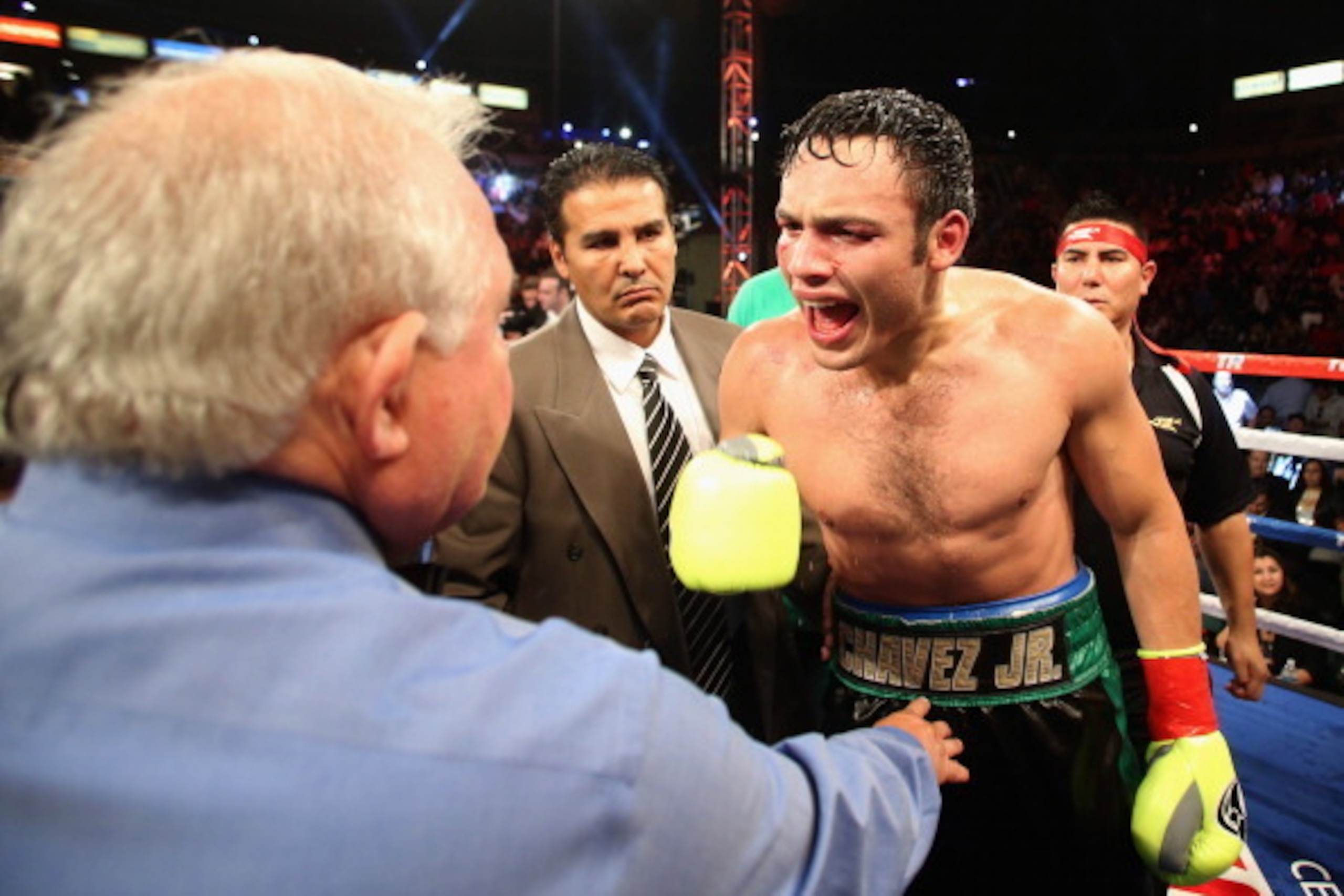 LOS ANGELES, CA - SEPTEMBER 28:  Julio Cesar Chavez Jr. argues with referee Lou Moret at the conclusion of his Light Heavyweight bout against Brian Vera at StubHub Center on September 28, 2013 in Los Angeles, California.  (Photo by Jeff Gross/Getty Images