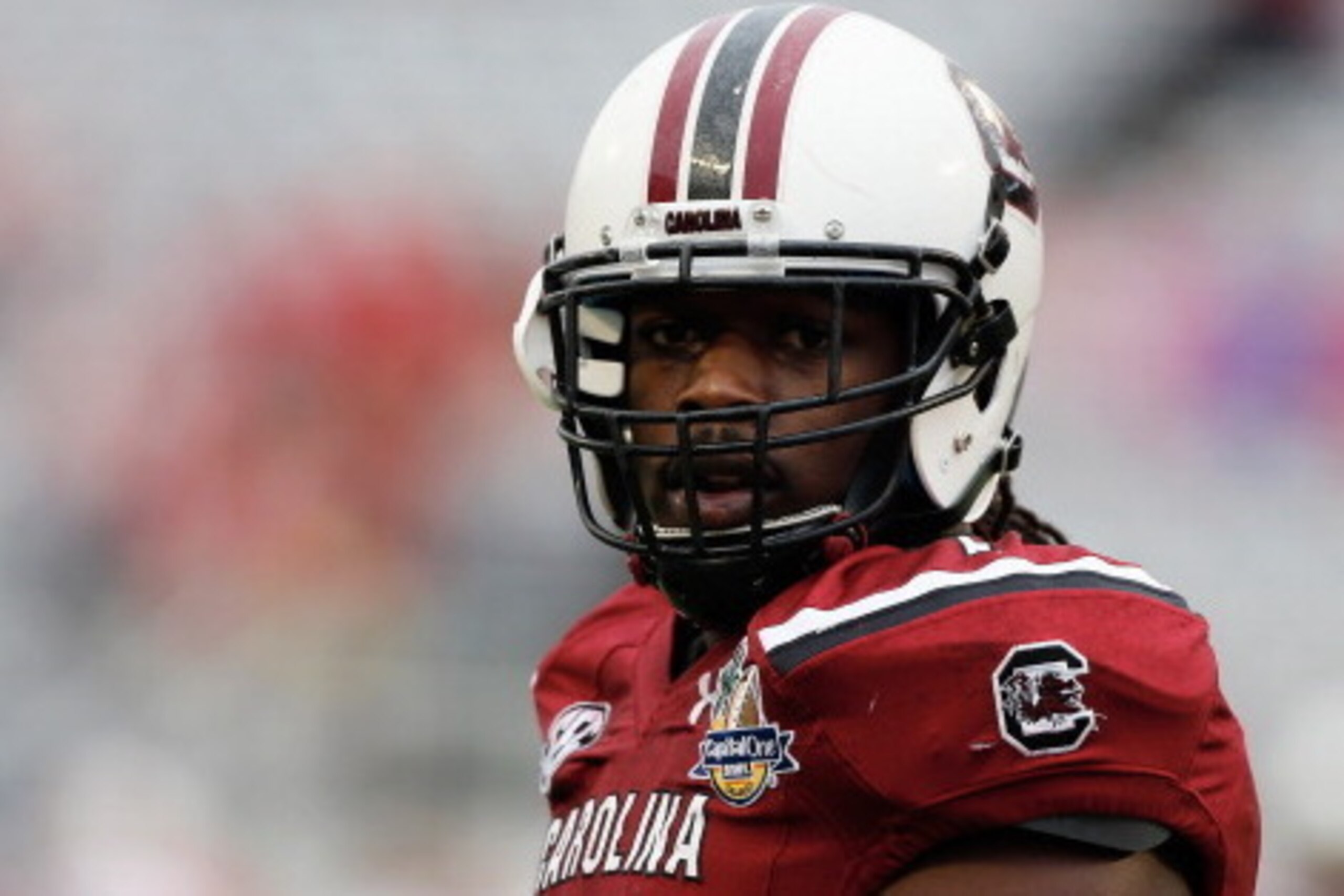 ORLANDO, FL - JANUARY 01:  Jadeveon Clowney #7 of the South Carolina Gamecocks works out on the field before the start of their game against the Wisconsin Badgers at the Capital One Bowl on January 1, 2014 in Orlando, Florida.  (Photo by Scott Halleran/Ge