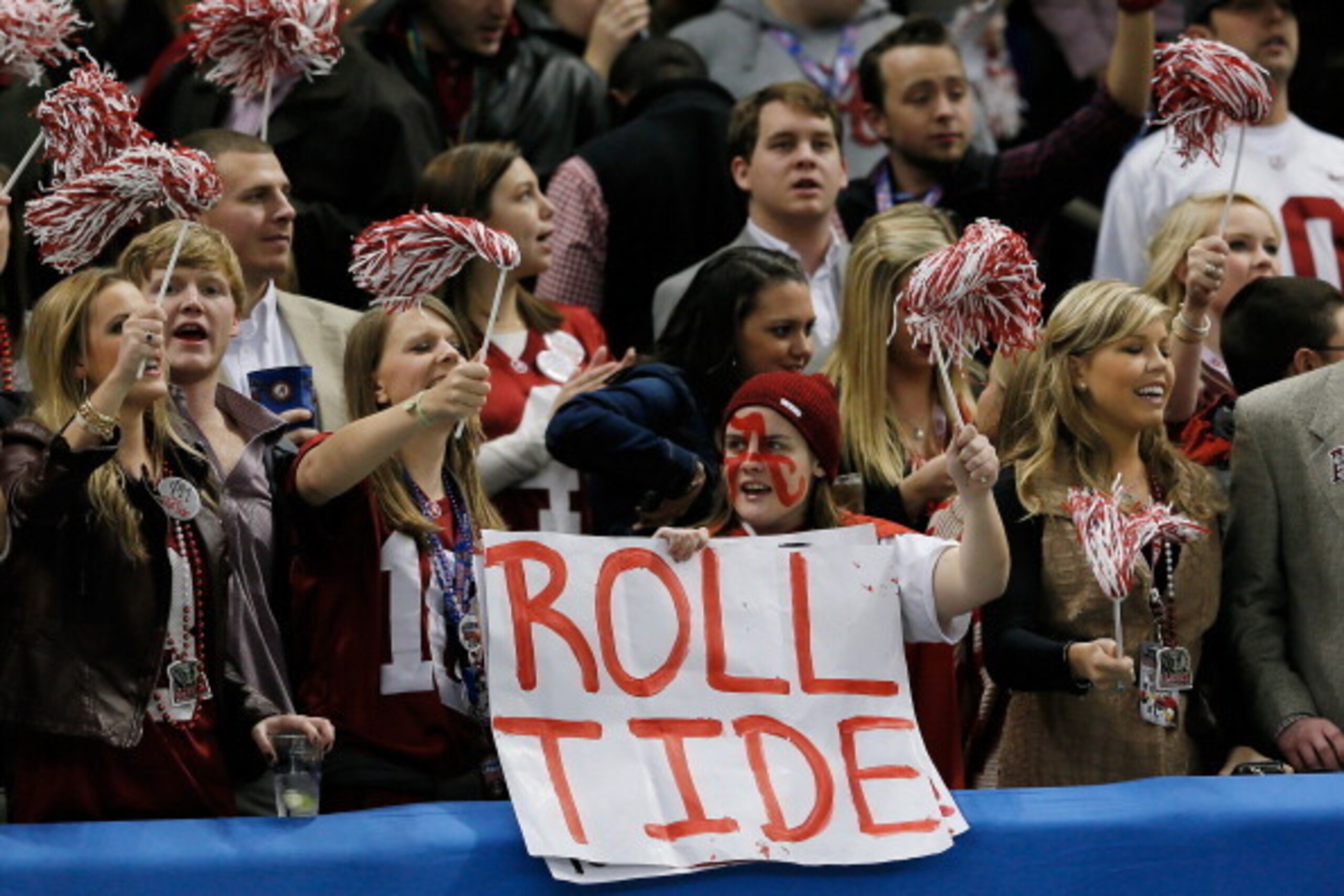 NEW ORLEANS, LA - JANUARY 02:  Fans of the Alabama Crimson Tide cheer prior to playing the Oklahoma Sooners during the Allstate Sugar Bowl at the Mercedes-Benz Superdome on January 2, 2014 in New Orleans, Louisiana.  (Photo by Kevin C. Cox/Getty Images)