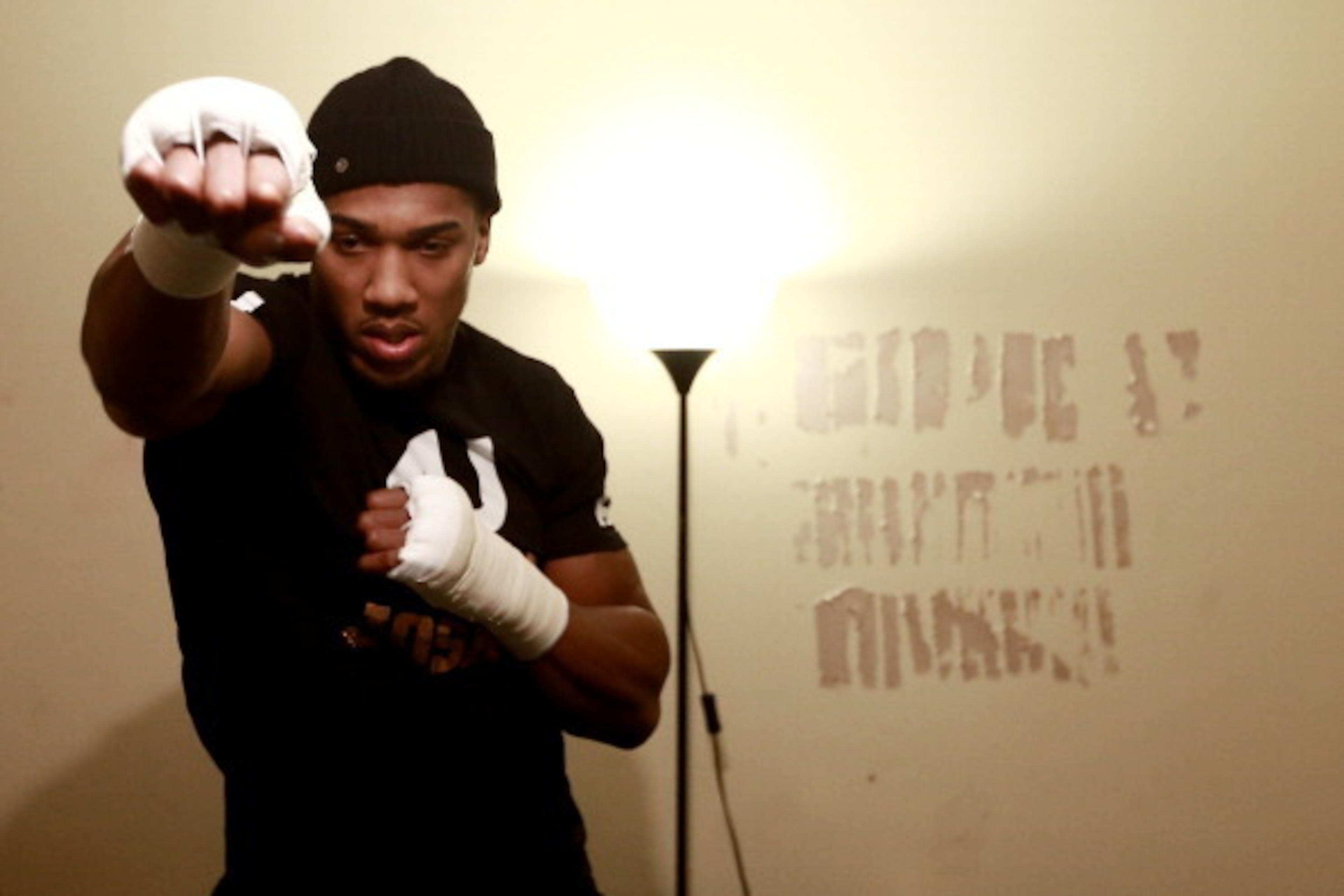 LONDON, ENGLAND - NOVEMBER 14:  Anthony Joshua in the changing room prior to his Heavyweight bout with Hrvoije Kisicek at York Hall on November 14, 2013 in London, England.  (Photo by Scott Heavey/Getty Images)