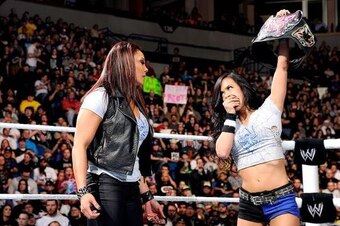AJ Lee is unhappy with Tamina Snuka after her title bout.