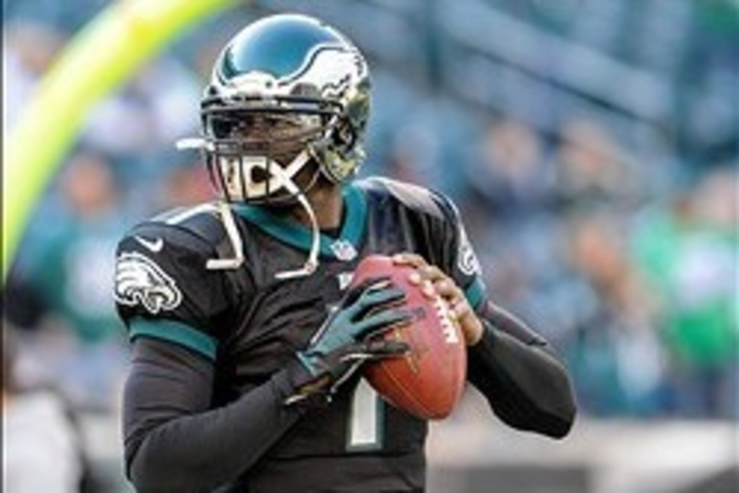 Dec 1, 2013; Philadelphia, PA, USA; Philadelphia Eagles quarterback Michael Vick (7) warms up before the game against the Arizona Cardinals at Lincoln Financial Field. Mandatory Credit: John Geliebter-USA TODAY Sports