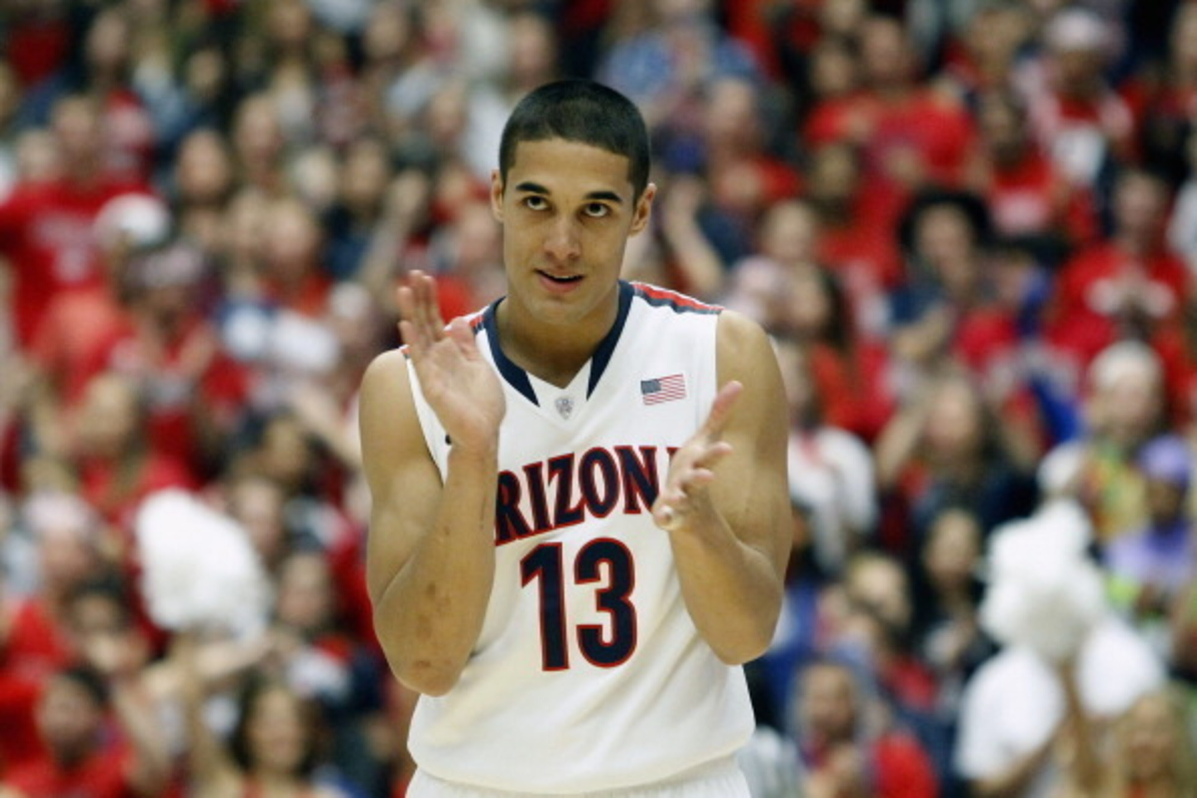 TUCSON, AZ - FEBRUARY 06:  Nick Johnson #13 of the Arizona Wildcats reacts after a basket against the Oregon Ducks during the second half of a college basketball game at McKale Center on February 6, 2014 in Tucson, Arizona.  The Wildcats defeated the Duck