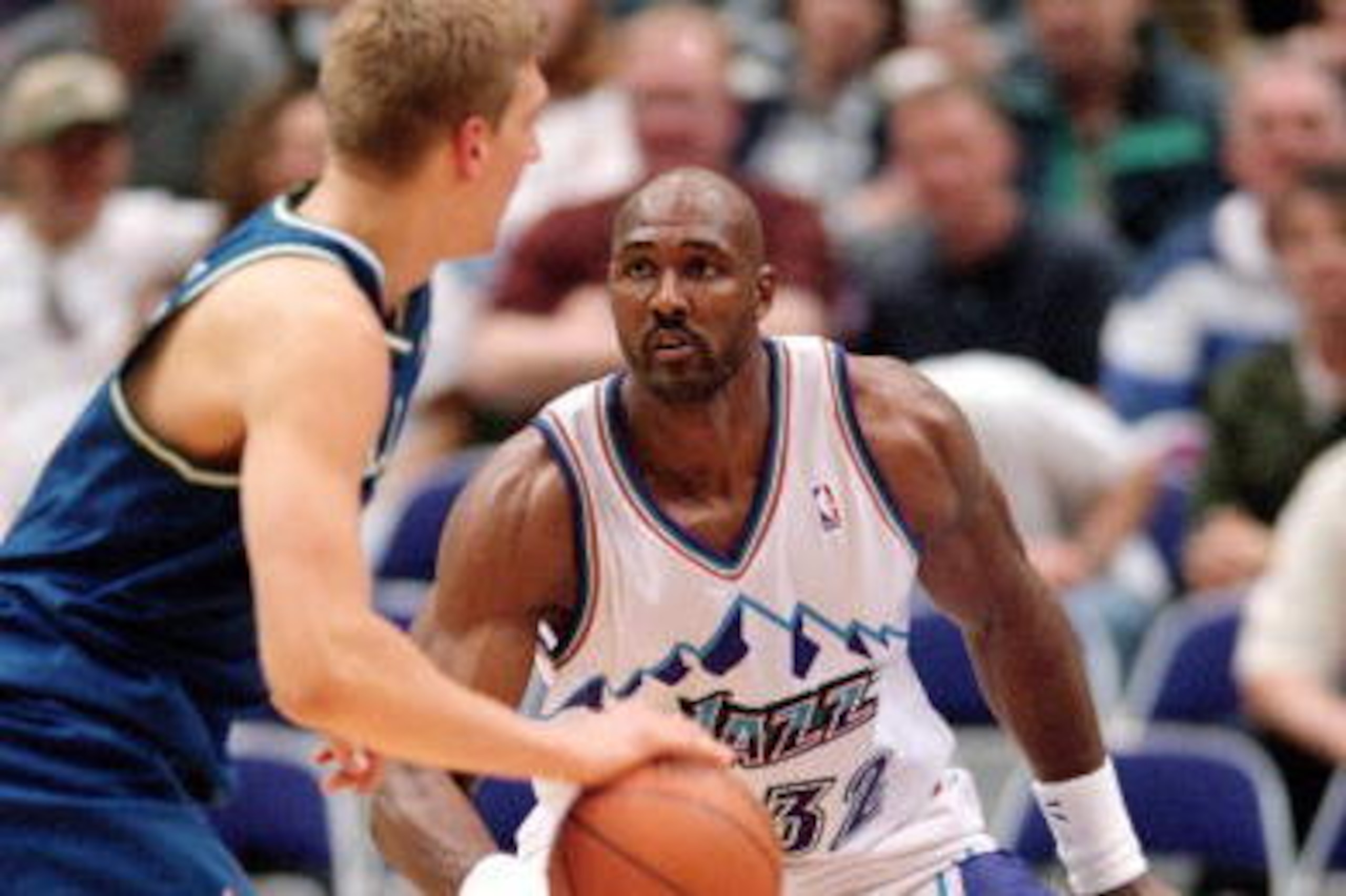 27 Mar 2000:  Karl Malone #32 of the Utah Jazz guards Dirk Nowitzki #41of the Dallas Mavericks at the Delta Center in Salt Lake City, Utah. The Mavericks defeated the Jazz 113-105.     Mandatory Credit: Otto Greule Jr.  /Allsport