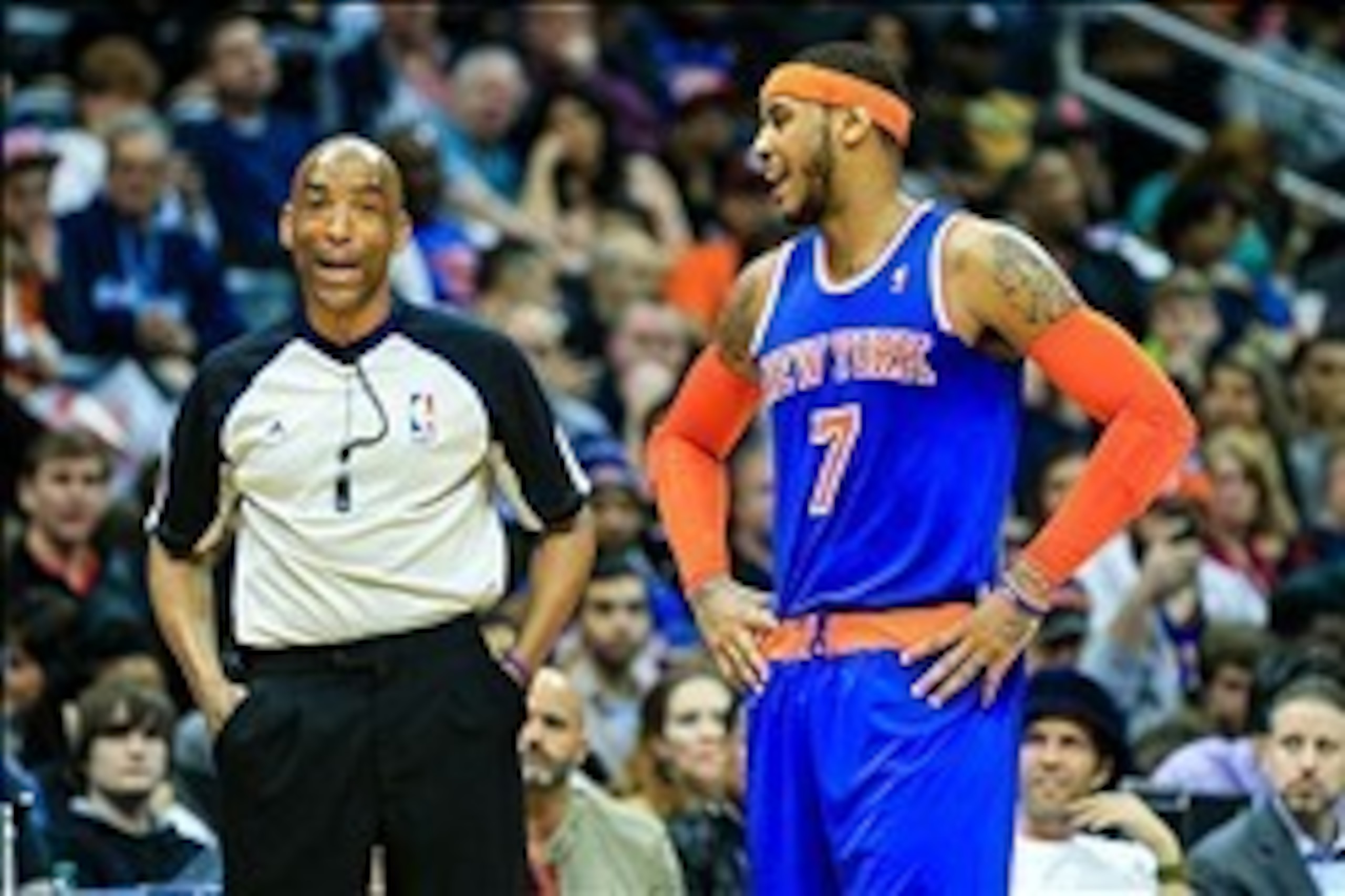 Feb 22, 2014; Atlanta, GA, USA; New York Knicks small forward Carmelo Anthony (7) talks to a referee after a foul in the second half against the Atlanta Hawks at Philips Arena. The Hawks won 107-98. Mandatory Credit: Daniel Shirey-USA TODAY Sports