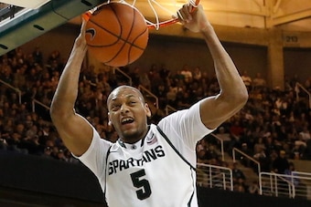 EAST LANSING, MI - DECEMBER 28:  Adreian Payne #05 of the Michigan State Spartans drives the ball to the basket during the second half of the game against the New Orleans Privateers at the Breslin Center on December 28, 2013 in East Lansing, Michigan. The