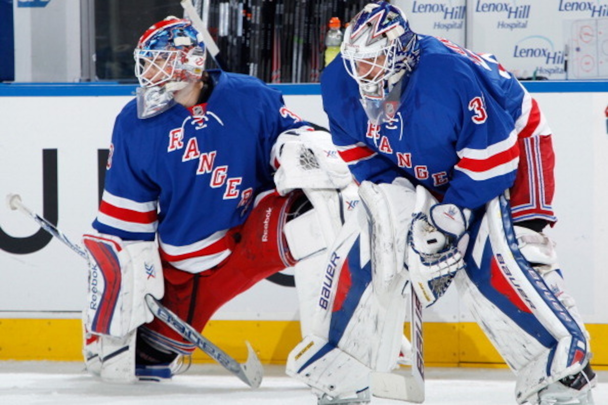 NEW YORK, NY - NOVEMBER 17:  Henrik Lundqvist #30 and Cam Talbot #33 of the New York Rangers look on during warm-ups prior to a game against the Los Angeles Kings at Madison Square Garden on November 17, 2013 in New York City. (Photo by Scott Levy/NHLI vi