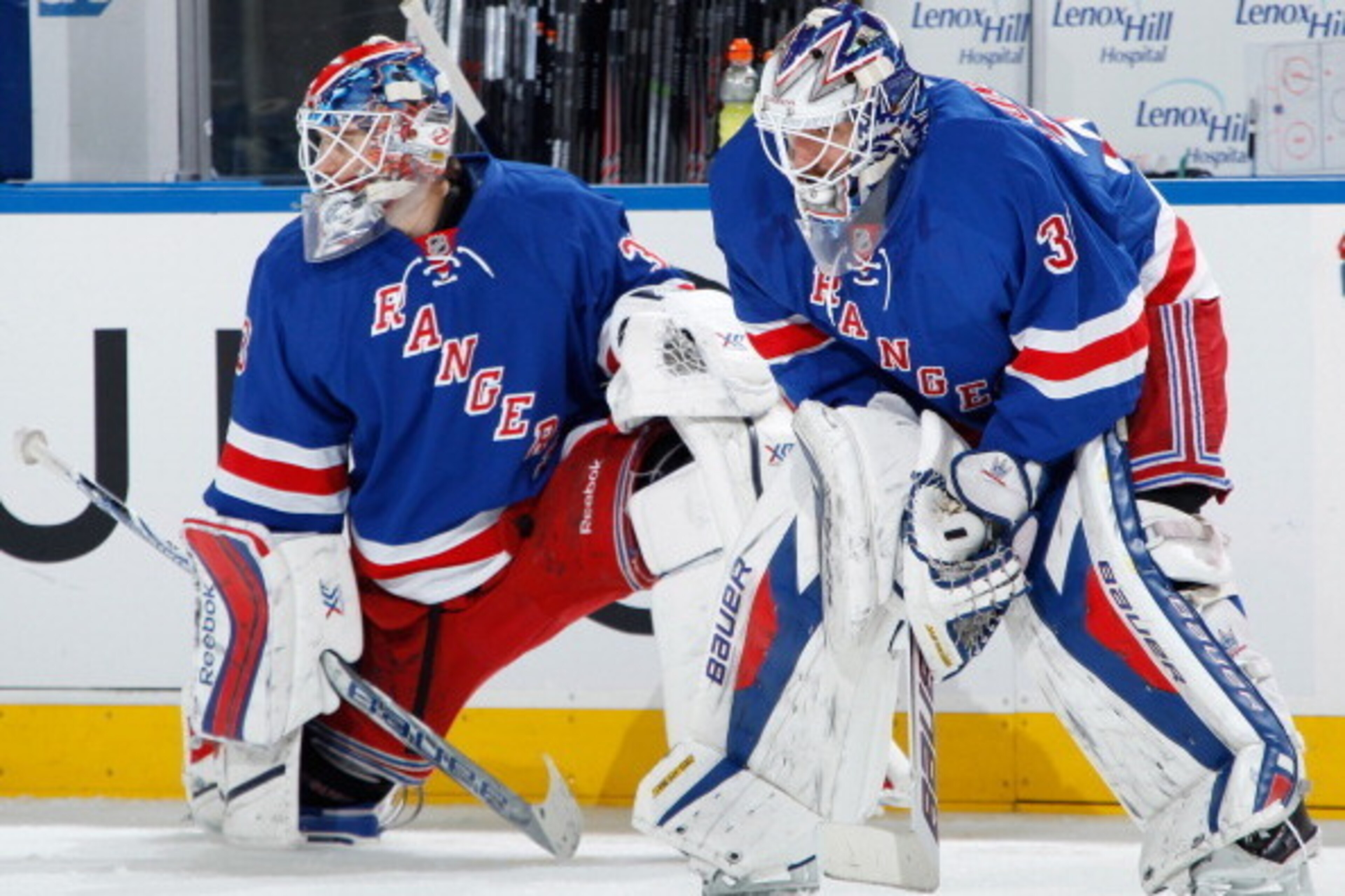 NEW YORK, NY - NOVEMBER 17:  Henrik Lundqvist #30 and Cam Talbot #33 of the New York Rangers look on during warm-ups prior to a game against the Los Angeles Kings at Madison Square Garden on November 17, 2013 in New York City. (Photo by Scott Levy/NHLI vi