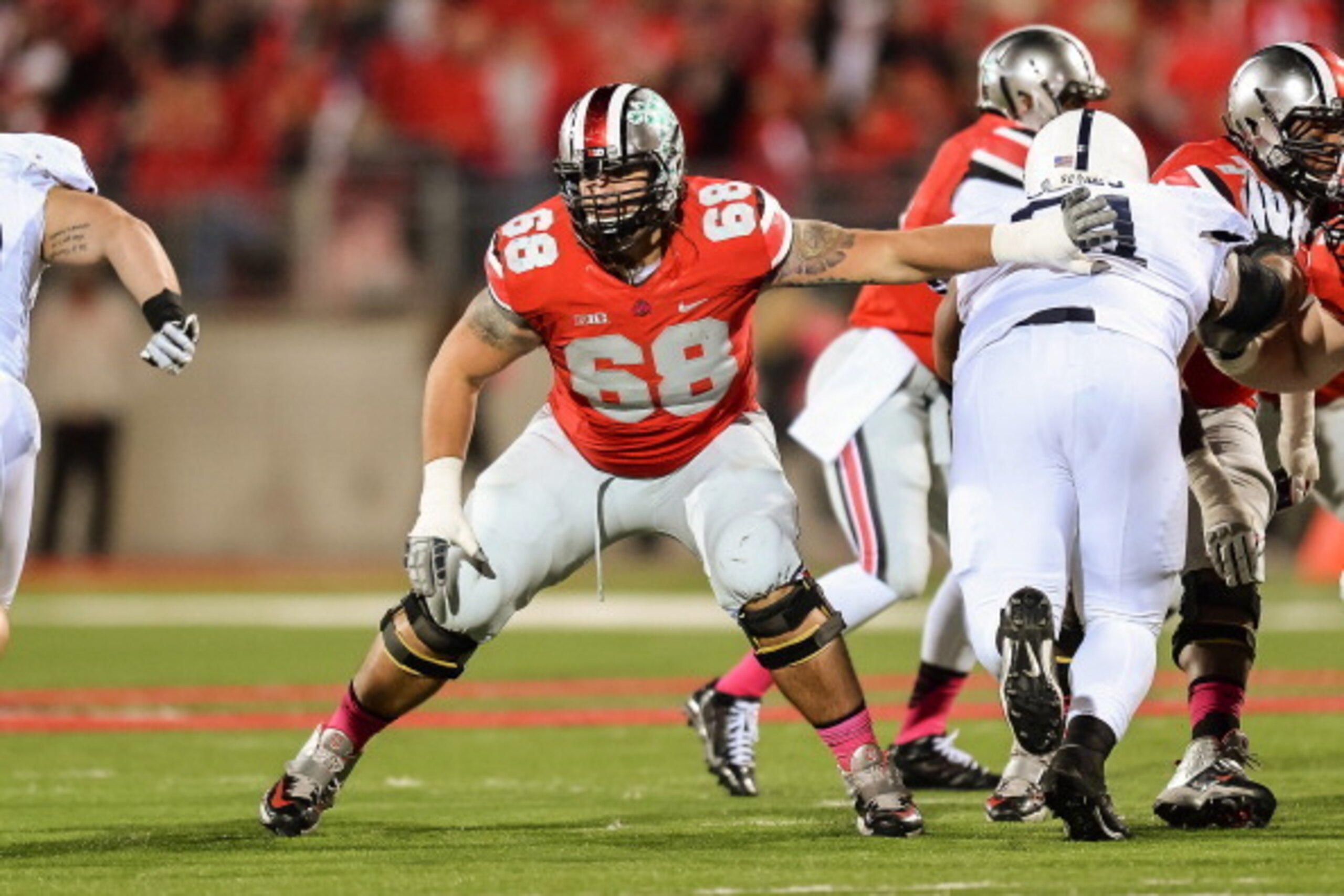 COLUMBUS, OH - OCTOBER 26: Taylor Decker #68 of the Ohio State Buckeyes blocks against the Penn State Nittany Lions at Ohio Stadium on October 26, 2013 in Columbus, Ohio. (Photo by Jamie Sabau/Getty Images) COLUMBUS, OH - OCTOBER 26: Taylor Decker #68 of the Ohio State Buckeyes blocks against the Penn State Nittany Lions at Ohio Stadium on October 26, 2013 in Columbus, Ohio. (Photo by Jamie Sabau/Getty Images)