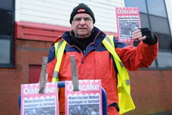STOKE ON TRENT, ENGLAND - FEBRUARY 01: A Stoke City fanzine seller is pictured outside the ground prior to the Barclays Premier League match between Stoke City and Manchester United at Britannia Stadium on February 1, 2014 in Stoke on Trent, England.  (Ph