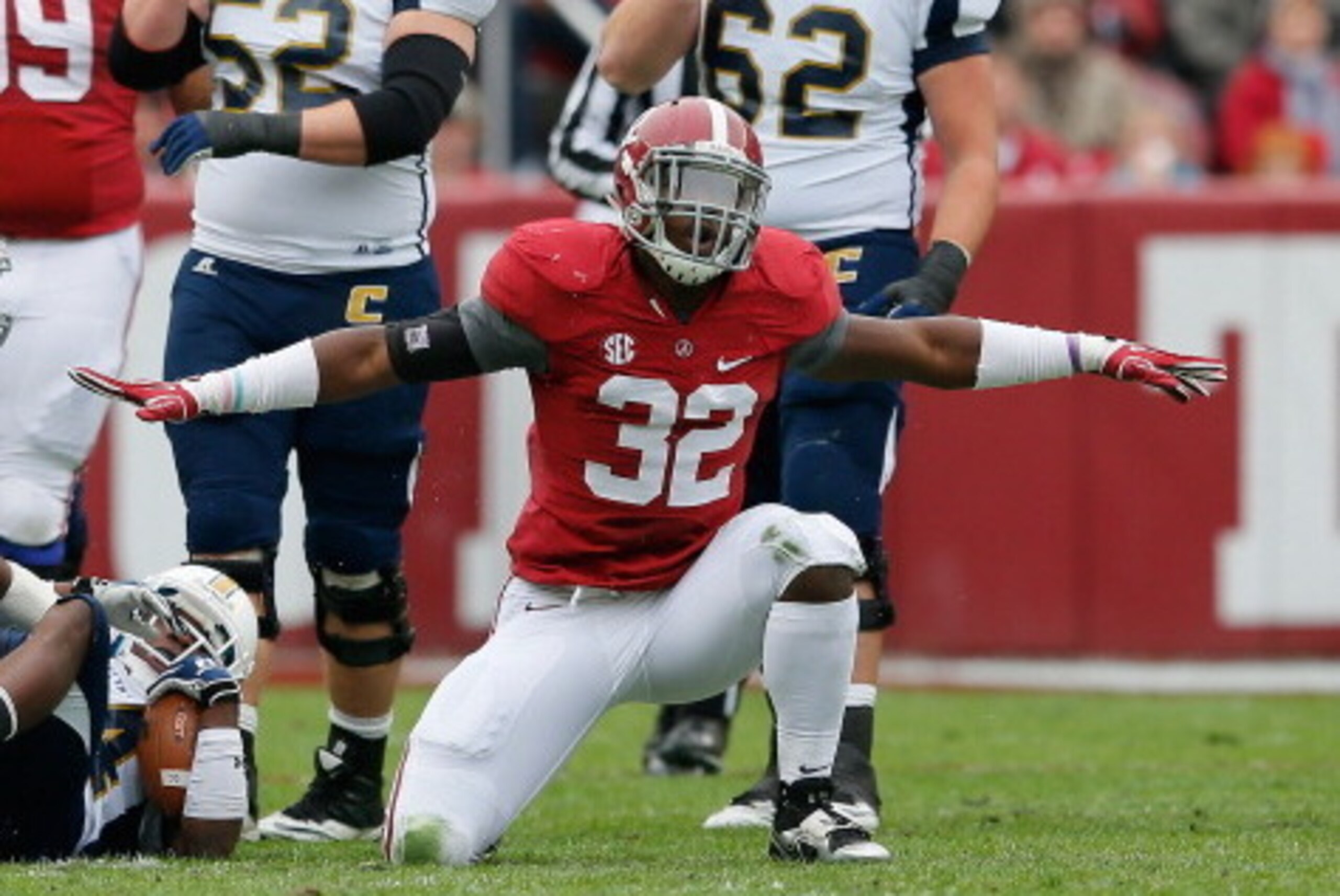 TUSCALOOSA, AL - NOVEMBER 23:  C.J. Mosley #32 of the Alabama Crimson Tide reacts after tackling Xavier Borishade #24 of the Chattanooga Mocs at Bryant-Denny Stadium on November 23, 2013 in Tuscaloosa, Alabama.  (Photo by Kevin C. Cox/Getty Images)