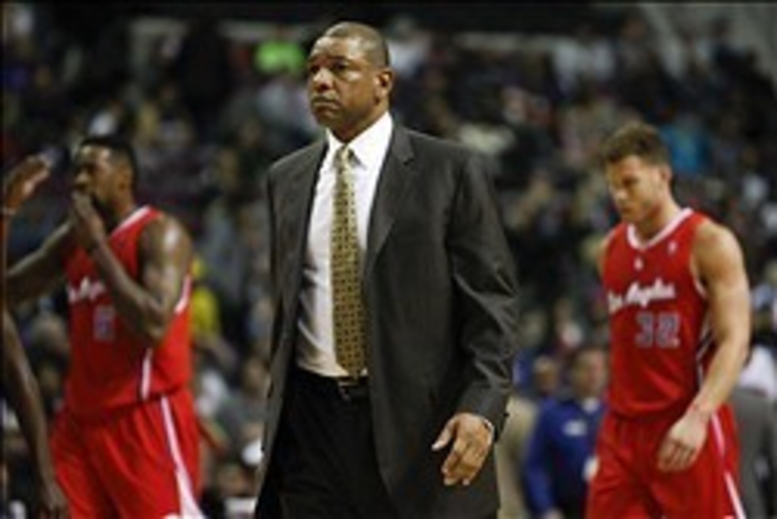 Jan 20, 2014; Auburn Hills, MI, USA; Los Angeles Clippers head coach Doc Rivers walk on the court during the first quarter against the Detroit Pistons at The Palace of Auburn Hills. Mandatory Credit: Raj Mehta-USA TODAY Sports