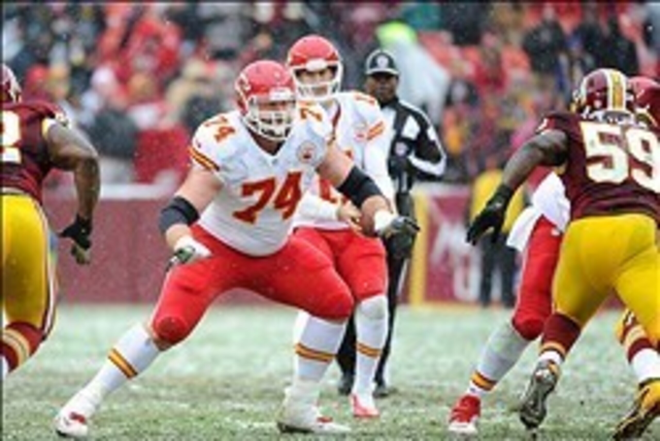 Dec 8, 2013; Landover, MD, USA; Kansas City Chiefs offensive lineman Geoff Schwartz (74) prepares to block against the Washington Redskins during the second quarter at FedEx Field. Mandatory Credit: Brad Mills-USA TODAY Sports