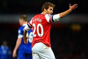 LONDON, ENGLAND - DECEMBER 08:  Mathieu Flamini of Arsenal shows his frustration during the Barclays Premier League match between Arsenal and Everton at Emirates Stadium on December 8, 2013 in London, England.  (Photo by Michael Regan/Getty Images)
