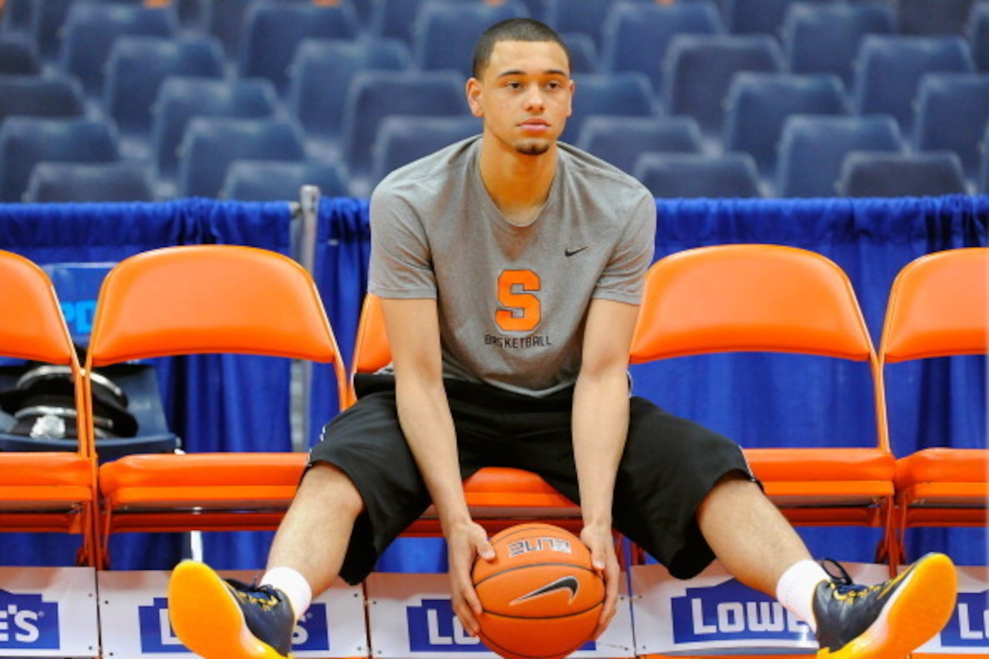SYRACUSE, NY - FEBRUARY 15:  Tyler Ennis #11 of the Syracuse Orange looks on prior to the game against the North Carolina State Wolfpack at the Carrier Dome on February 15, 2014 in Syracuse, New York.  (Photo by Rich Barnes/Getty Images)