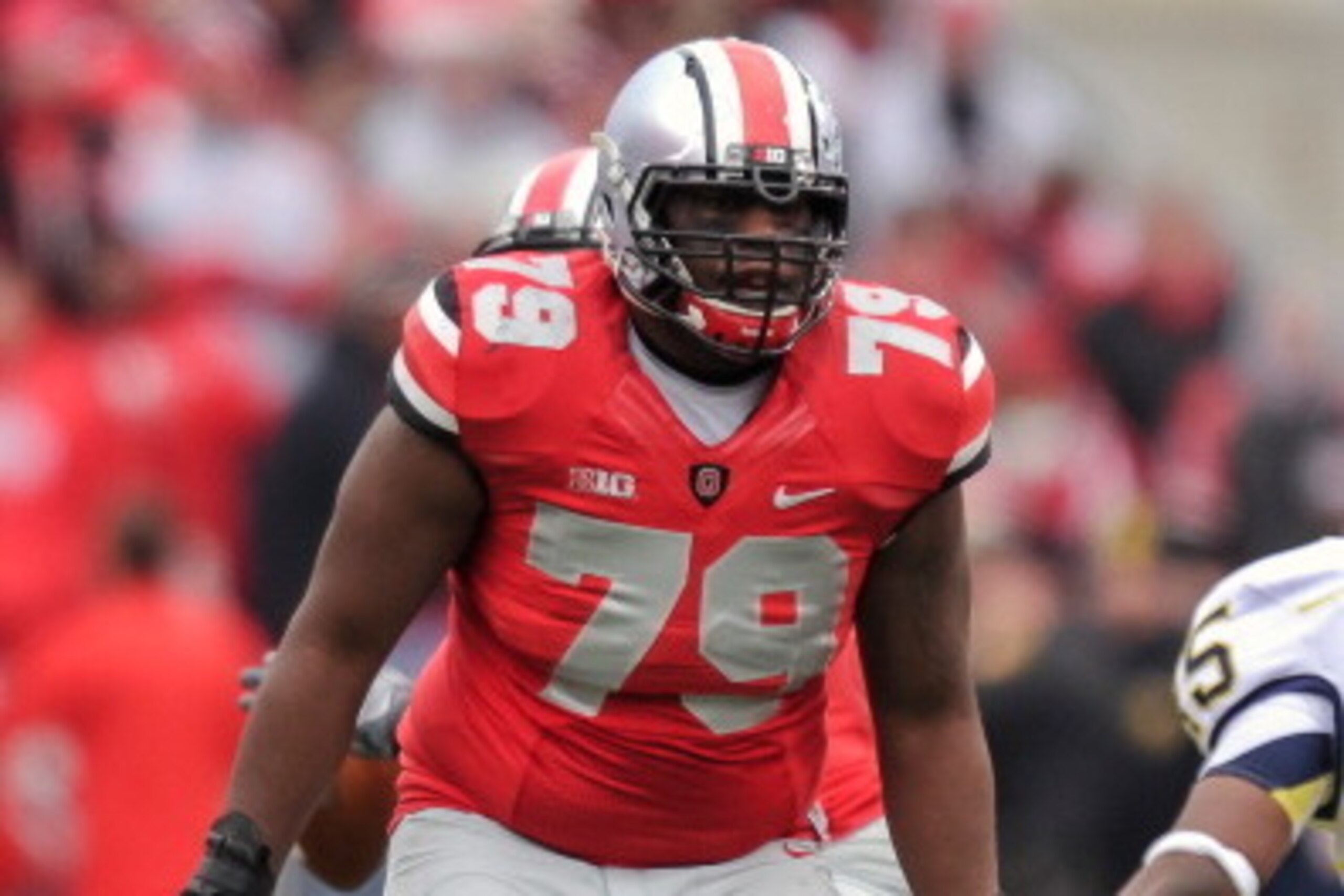 COLUMBUS, OH - NOVEMBER 24: Marcus Hall #79 of the Ohio State Buckeyes blocks against the Michigan Wolverines at Ohio Stadium on November 24, 2012 in Columbus, Ohio. (Photo by Jamie Sabau/Getty Images) COLUMBUS, OH - NOVEMBER 24: Marcus Hall #79 of the Ohio State Buckeyes blocks against the Michigan Wolverines at Ohio Stadium on November 24, 2012 in Columbus, Ohio. (Photo by Jamie Sabau/Getty Images)