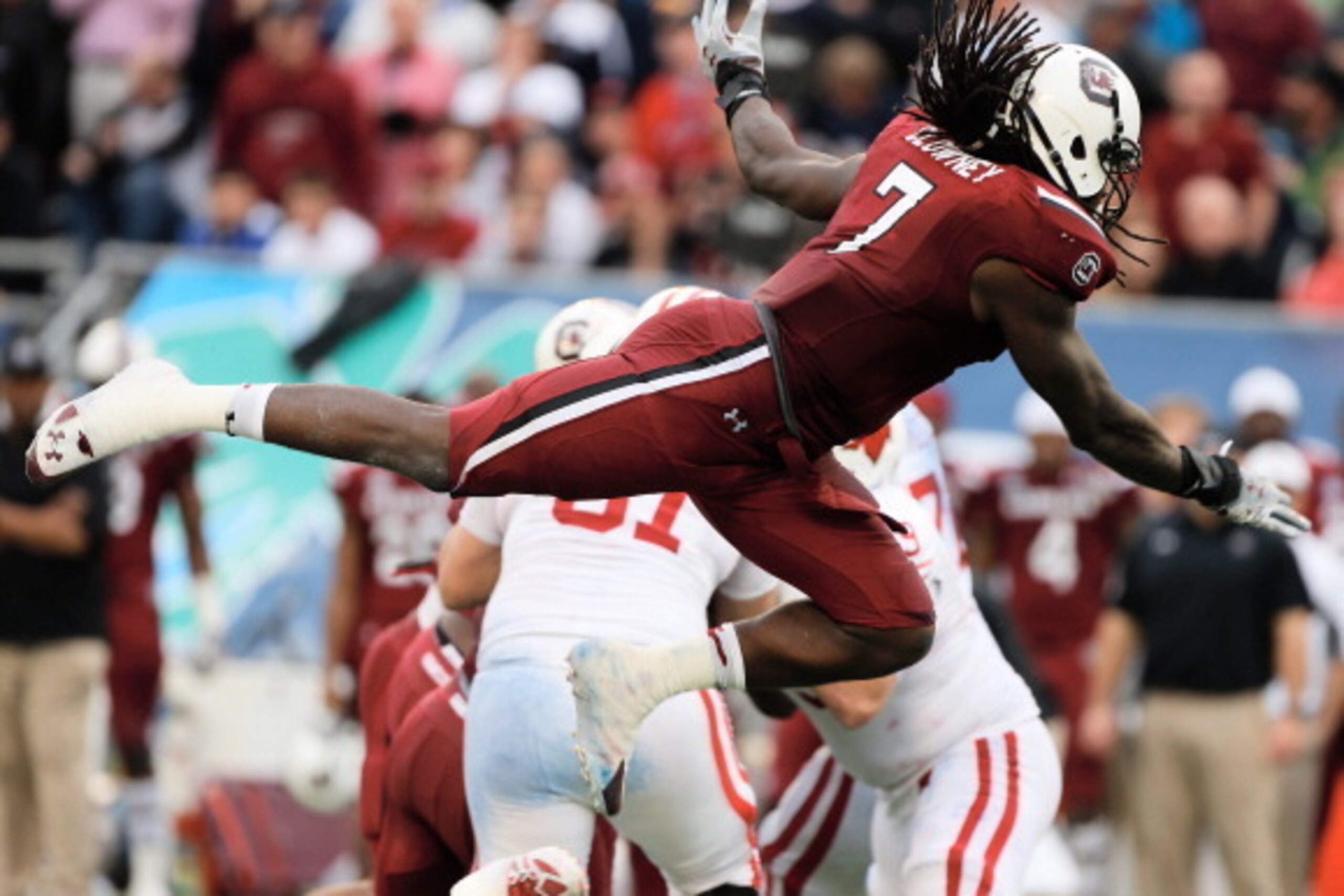 ORLANDO, FL - JANUARY 01:  Jadeveon Clowney #7 of the South Carolina Gamecocks in action during their game against the Wisconsin Badgers at the Capital One Bowl on January 1, 2014 in Orlando, Florida.  (Photo by Scott Halleran/Getty Images)